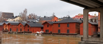 Old Porvoo riverside, featuring wooden storage buildings.