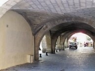 Arches of the old market square in Beaucaire