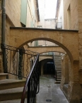 Beaucaire, house whose interior courtyard has a staircase partially enclosed in a turret