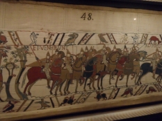 Scene fra Bayeux-tapetet: Williams kavalleri er gået i land/Scene from the Bayeux tapestry